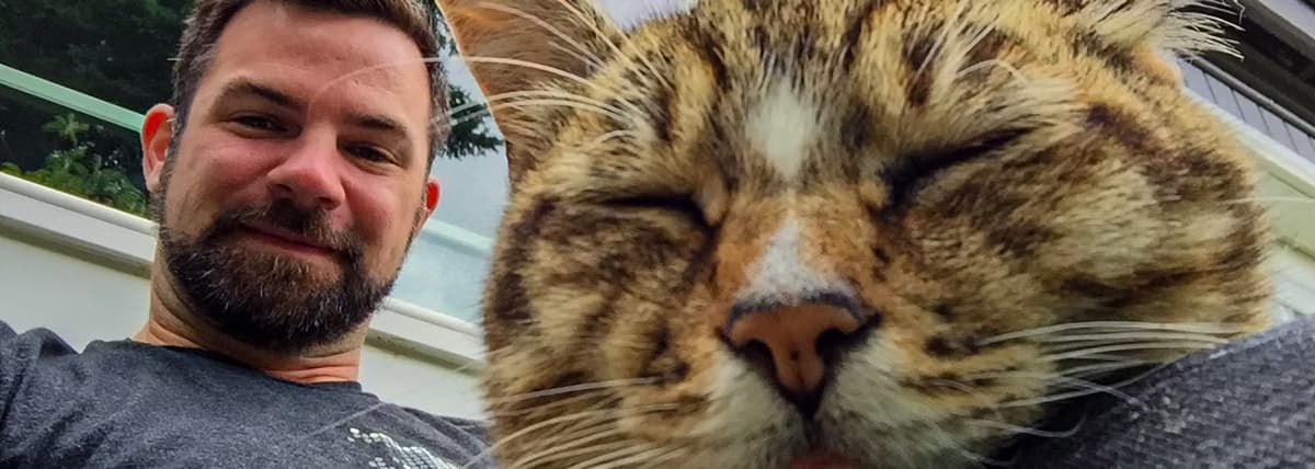 David with neighbor cat buddy in Seattle